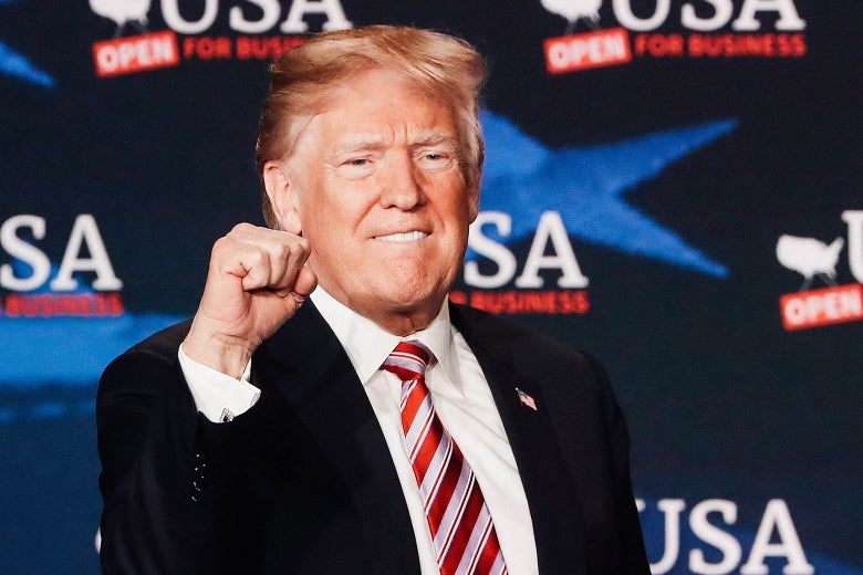 President Donald Trump attends a roundtable discussion about the Republican’s tax cut package he recently signed into law on Monday in Hialeah, Florida.